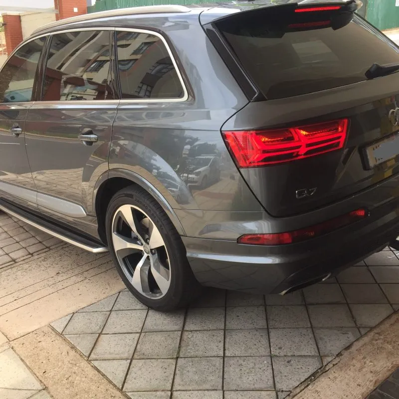 Rear view of a clean grey Audi Q7 SUV