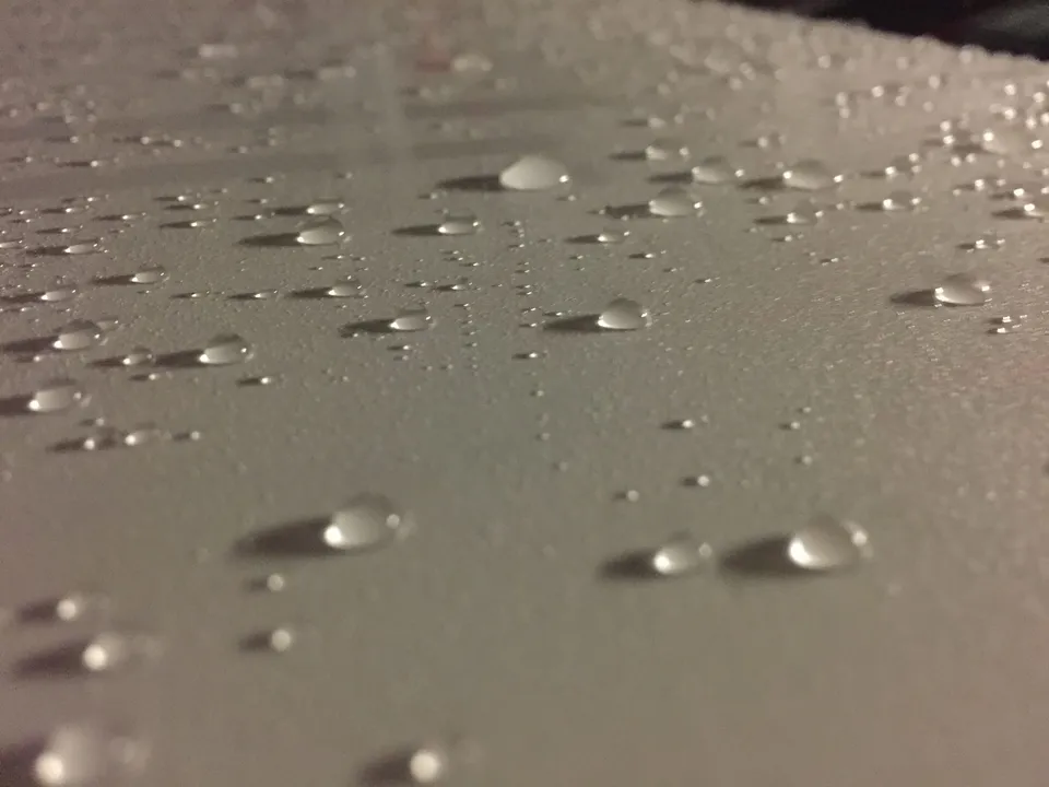 Water beading on a finished painted panel